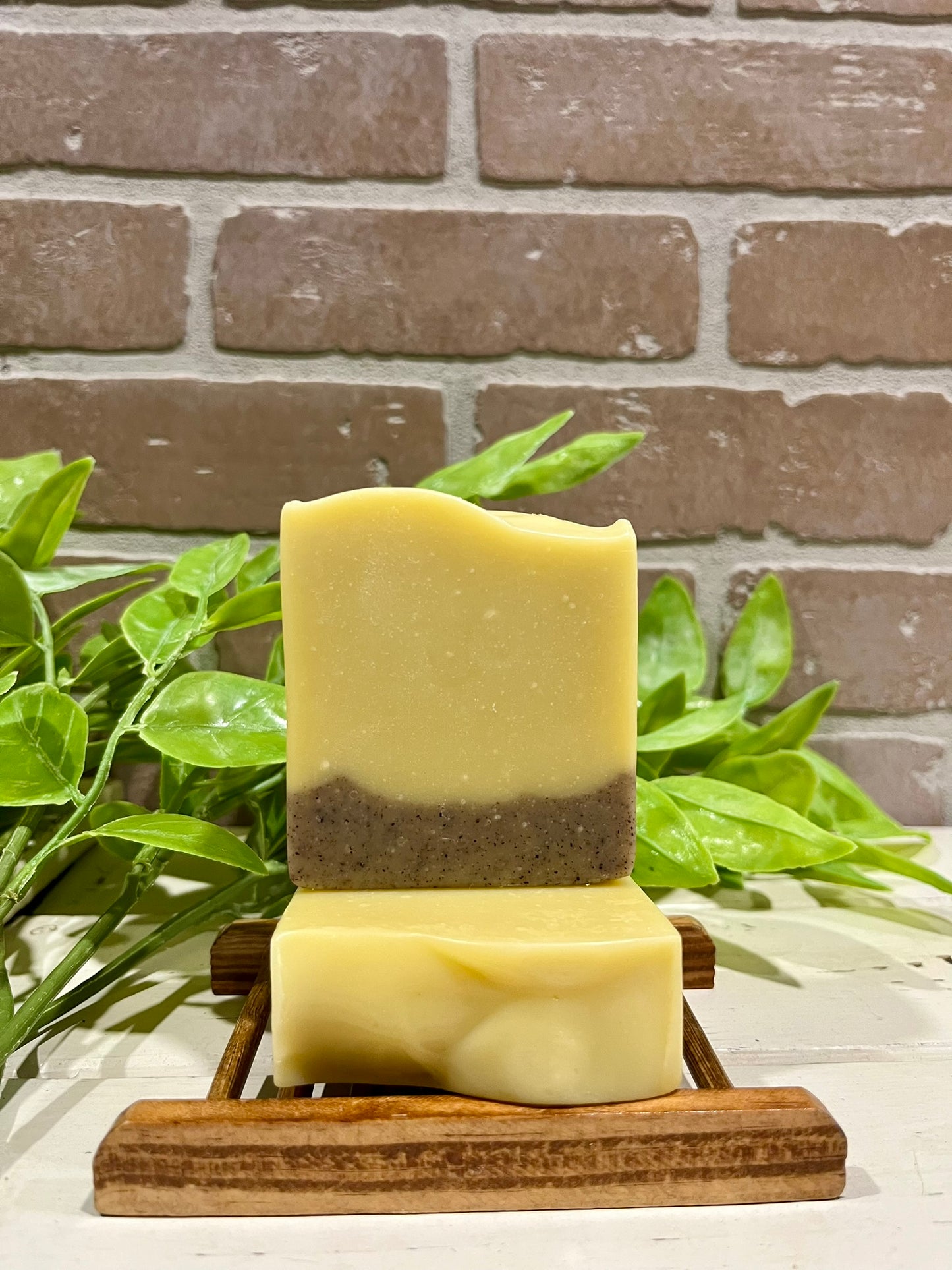 Lavender soap bars in front of brick wall