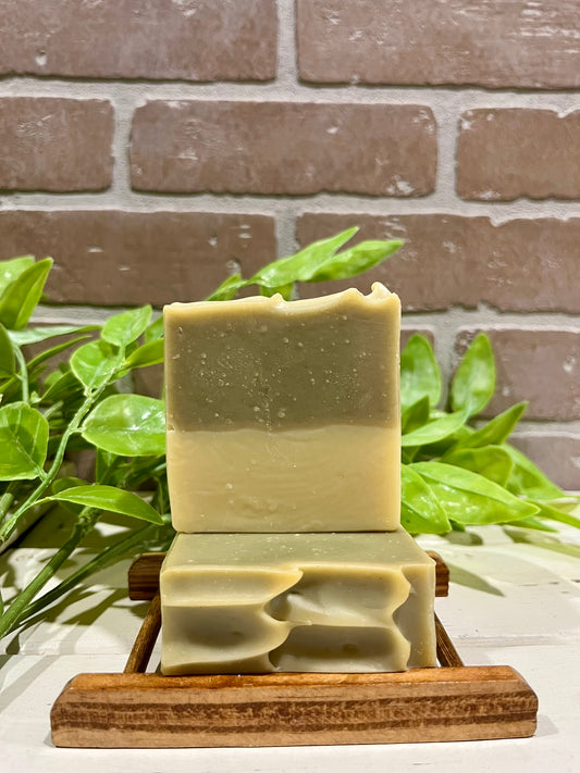 Spearmint eucalyptus soap bars in front of brick wall